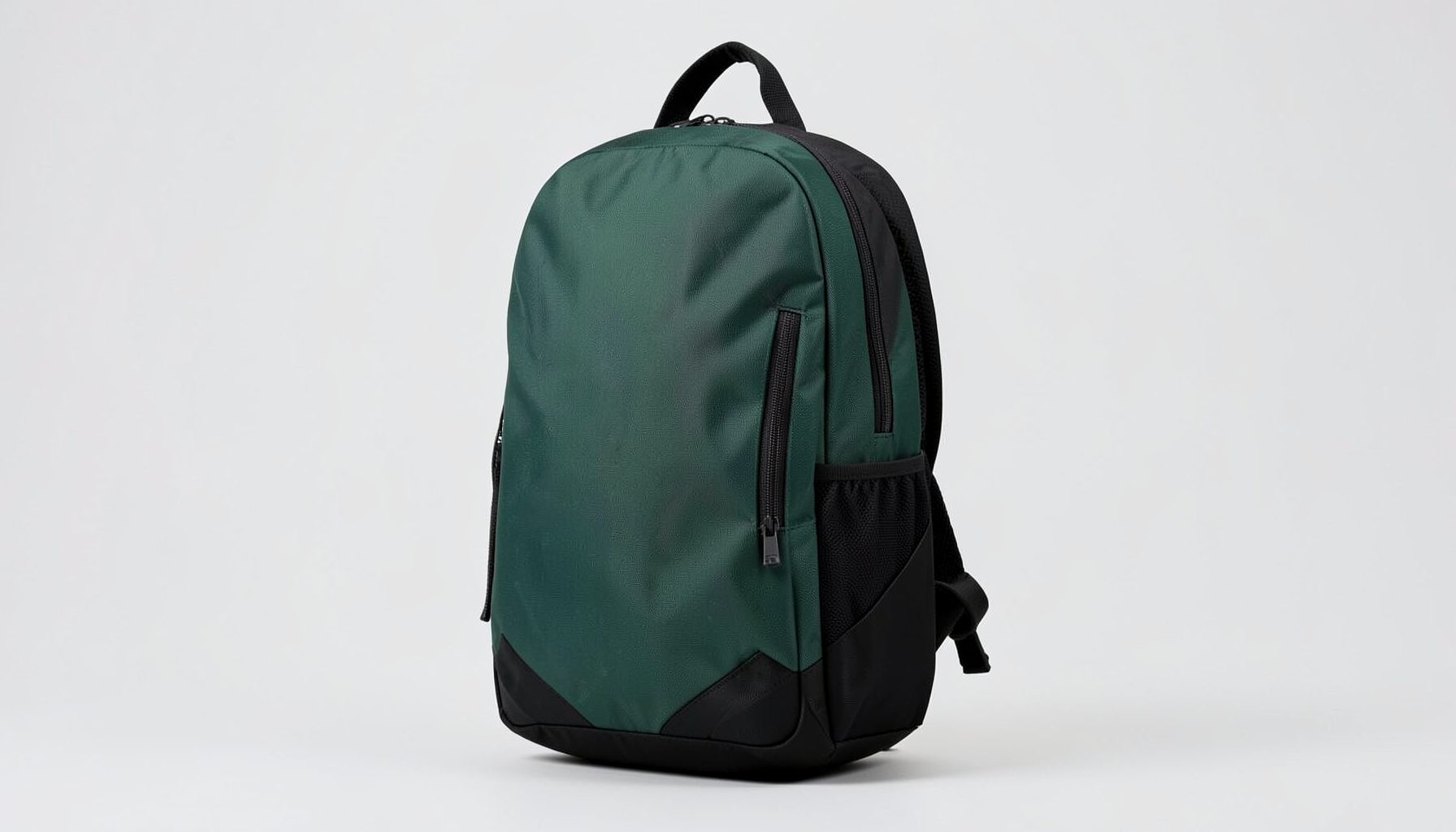 Athletic backpack in dark green and black, sleek streamlined silhouette